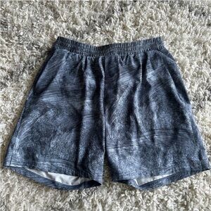 Lululemon Channel Cross Swim Short *7" Fjord
Tempest Blue Multi. Size large.